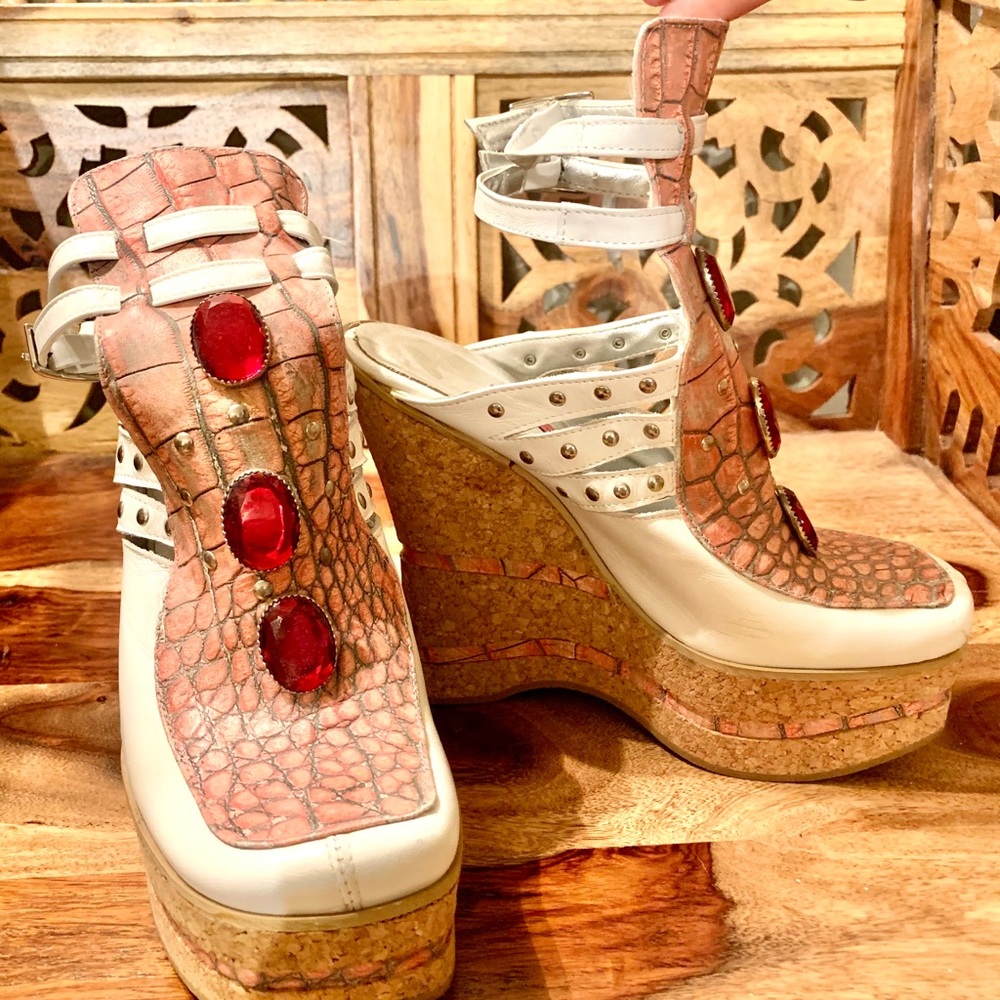 Snake skin leather platform heels.